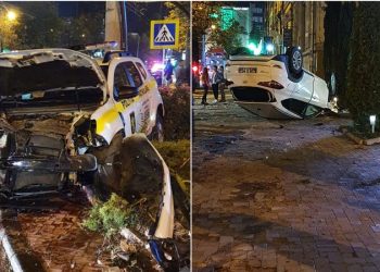 Accident violent în centrul capitalei: O mașină a poliției – grav avariată, iar un alt automobil s-a răsturnat
