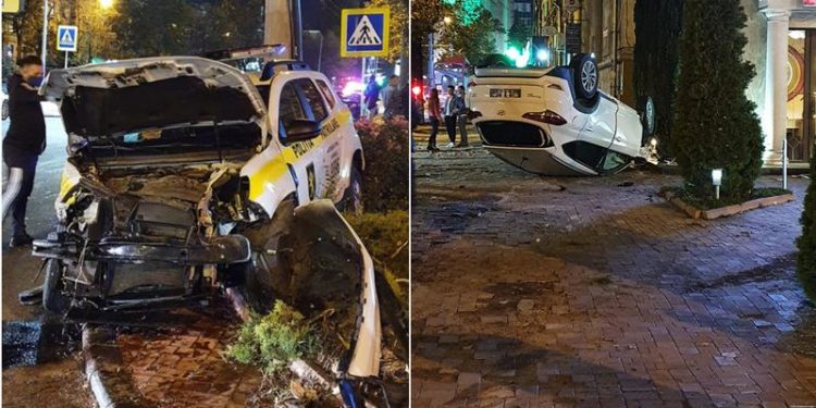 Accident violent în centrul capitalei: O mașină a poliției – grav avariată, iar un alt automobil s-a răsturnat