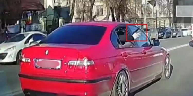 În BMW, cu geamul deschis și cu un pistol: „Gangsterul” din trafic, pe o stradă din centrul capitalei