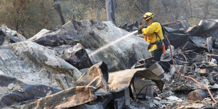 O femeie care încerca să-și fiarbă apă ar fi provocat ultimul incendiu care a devastat California | FOTO