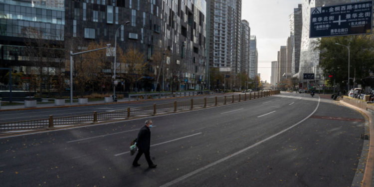 Un vârf, trei luni, trei valuri și un milion de morți. Scenariul Covid care a lăsat străzile pustii în marile orașe din China