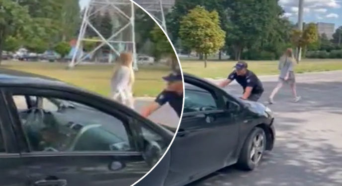 Show în plin trafic: Ce riscă șoferița care și-a abandonat mașina și s-a culcat pe asfalt după ce a fost oprită de polițiști | VIDEO