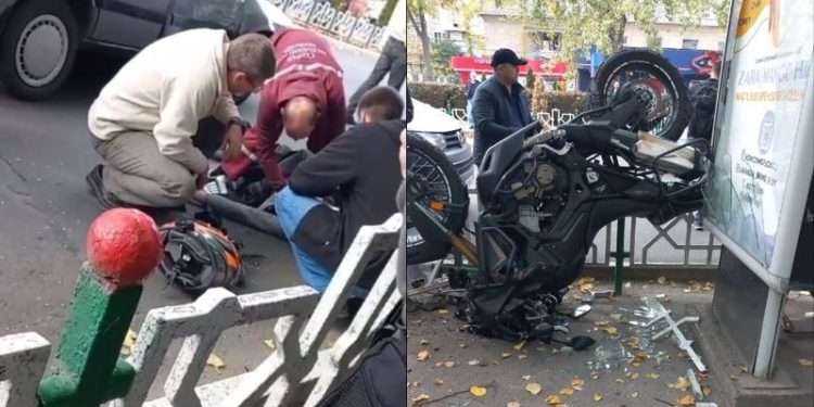 I-a zburat motocicleta peste gard: Bărbatul de la ghidon, preluat de o ambulanță, după ce s-a lovit cu un Audi | VIDEO