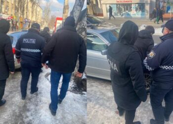 Un polițist – încătușat de ofițerii CNA. A luat mită și va fi plasat în izolator