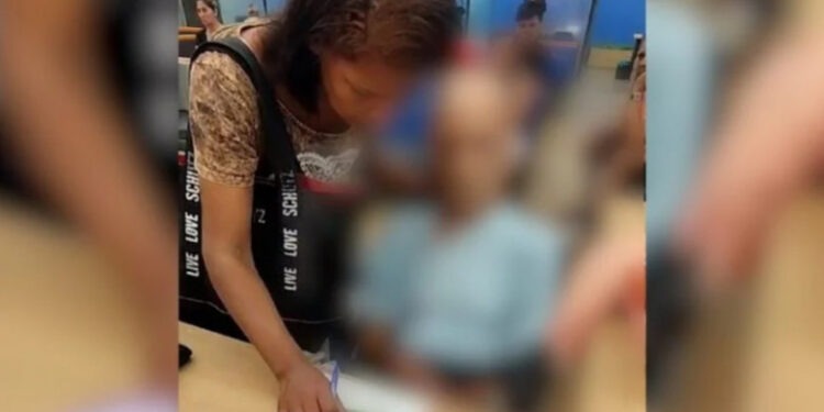 O femeie din Brazilia a mers cu un cadavru într-un scaun cu rotile la bancă, pentru a cere un împrumut