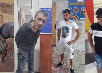Au furat o geantă și un telefon mobil. Trei bărbați, reținuți de polițiști