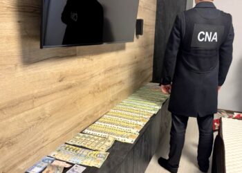 Bărbat din sudul țării reținut de CNA pentru 30 de cazuri de trafic de influență