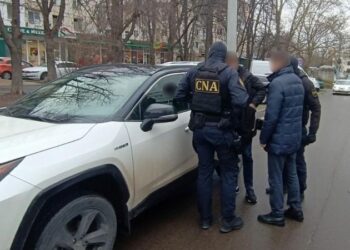 Percheziții CNA într-un dosar de corupție: Doi avocați suspectați de trafic de influență