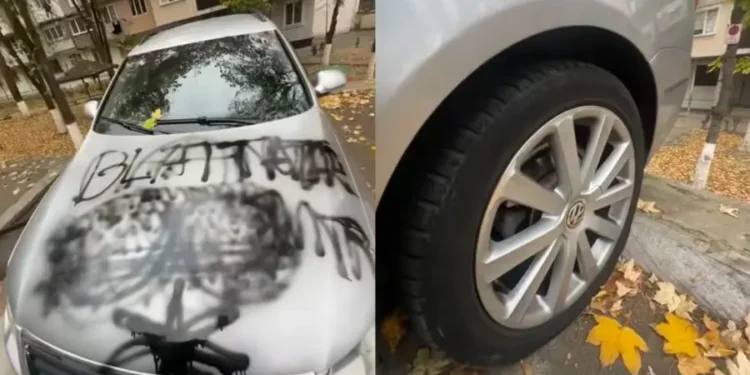 Conflict între vecini la Buiucani. Un șofer și-a găsit mașina cu roțile sparte și capota desenată